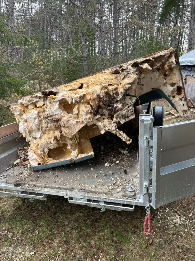 Trailer loaded with removed junk ready for disposal